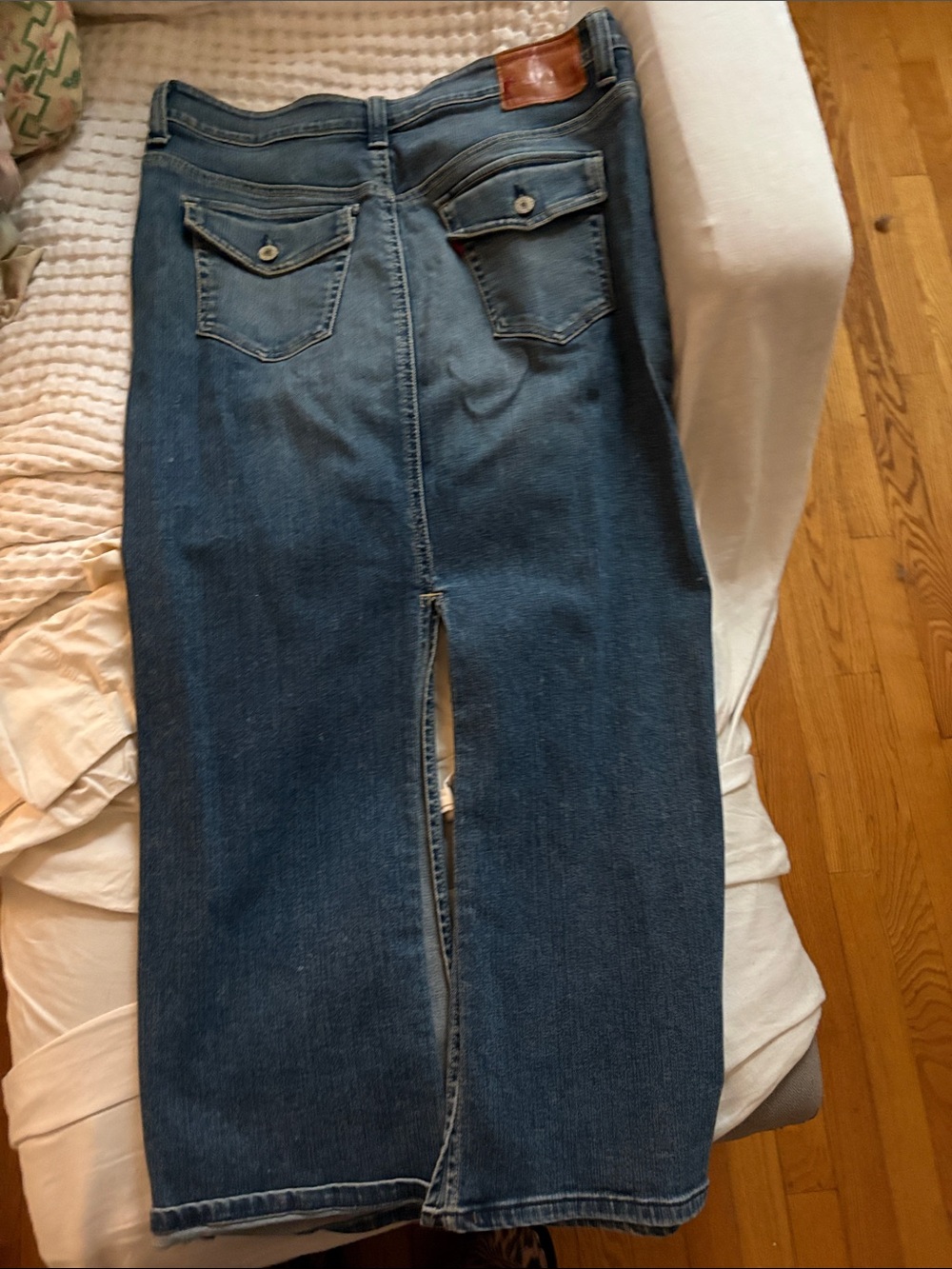 Levi's Medium Strechy Blue Denim Pencil Skirt with Back and front Slit.